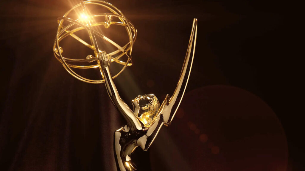 Emmy statue on a black background