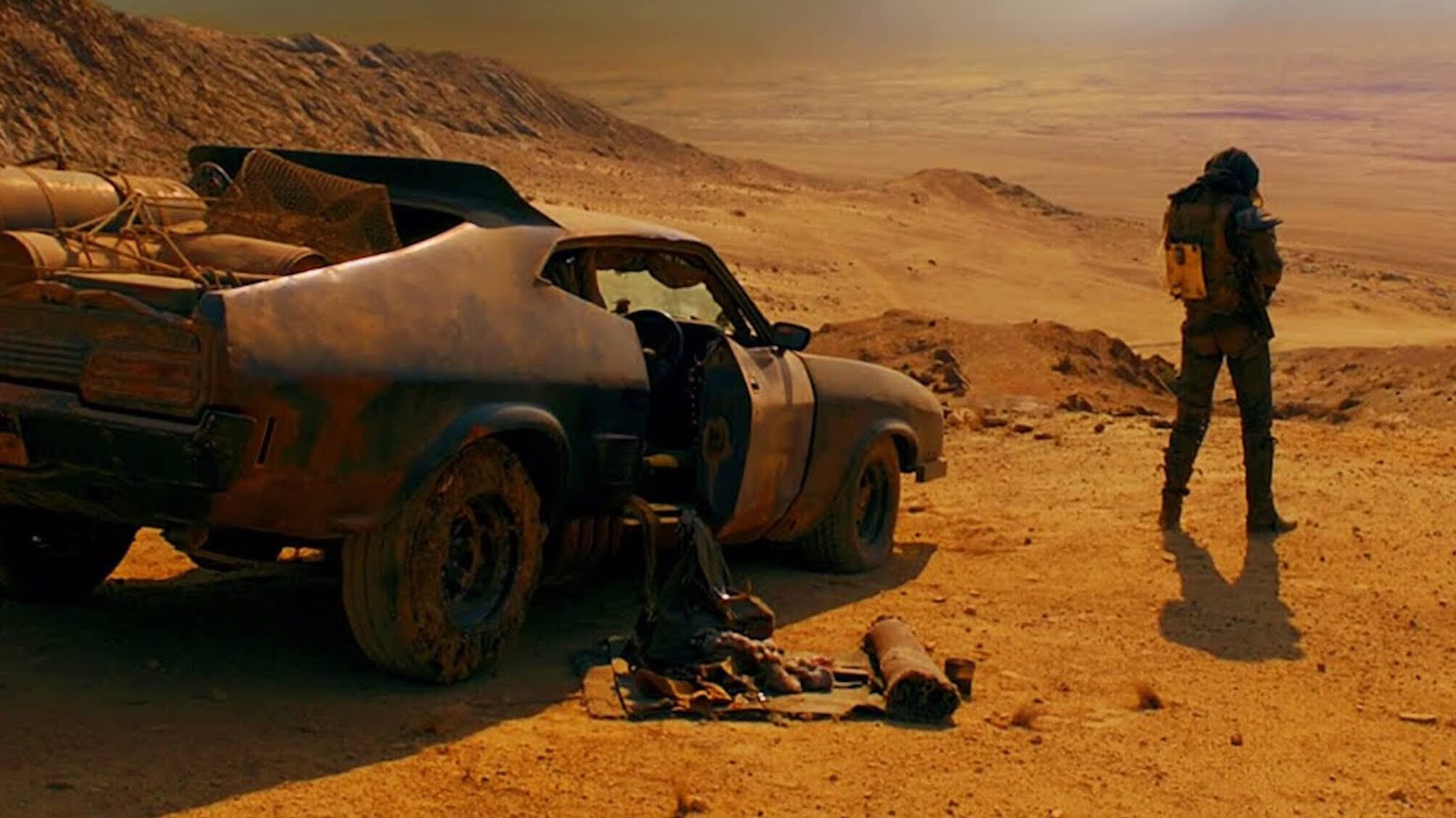 Max looking over the wasteland in 'Mad Max: Fury Road,' Future Nightmares: Dystopias That Hit the Big Screen