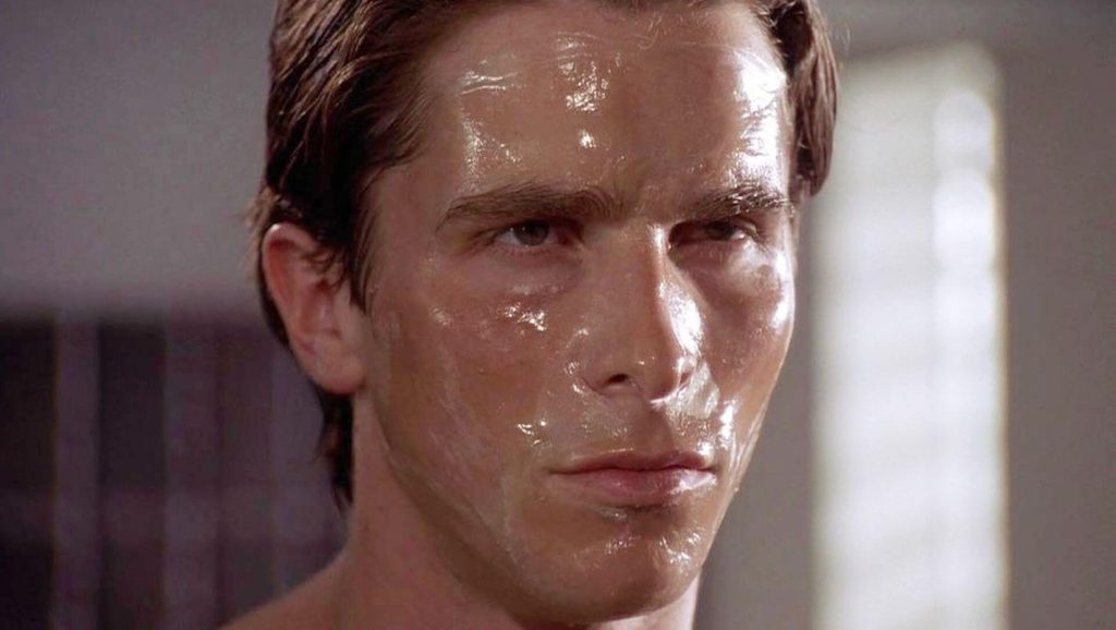 Patrick Bateman (Christian Bale) with his face mask in 'American Psycho,' What Is a Monologue and How Do You Write a Great One?