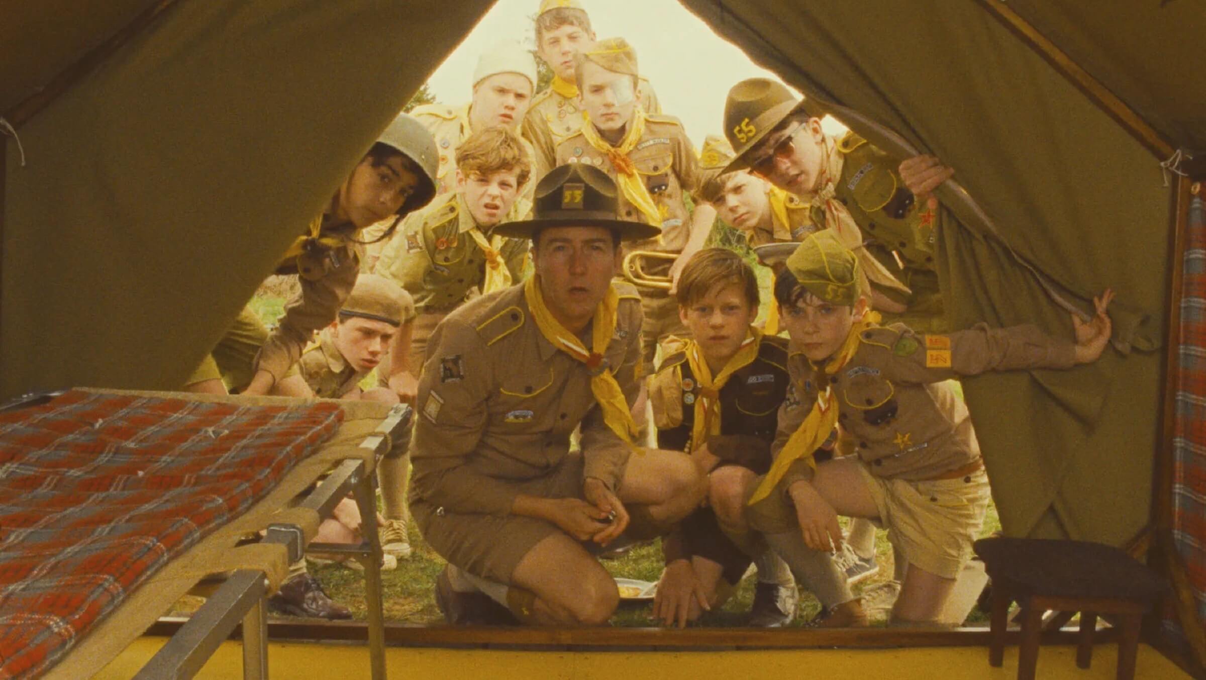 A troop of boys looking into a tent in 'Moonrise Kingdom,' Beat the Heat: Essential Summer Movies to Help You Stay Cool