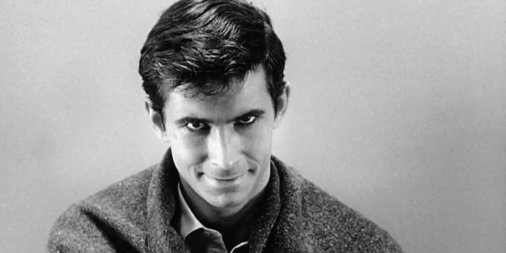 A black and white image of Norman Bates at the end of 'Psycho'